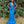 JOVANI 38758 Sequin Mesh Sheath Dress with V-Neckline and Feather Shoulder Detail - Royal or Lilac