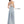 Clarisse 8051 is a halter neck long prom dress with a beaded belt, open back, and shimmering a-line knit skirt. (Back - Aqua)