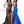 Envious Couture E1741 in Royal by Karishma Creations is a full length shimmering Prom Dress featuring a plunging halter neckline with criss cross back detail. A fit-n-n-flare silhouette with a high slit and sweet train. 